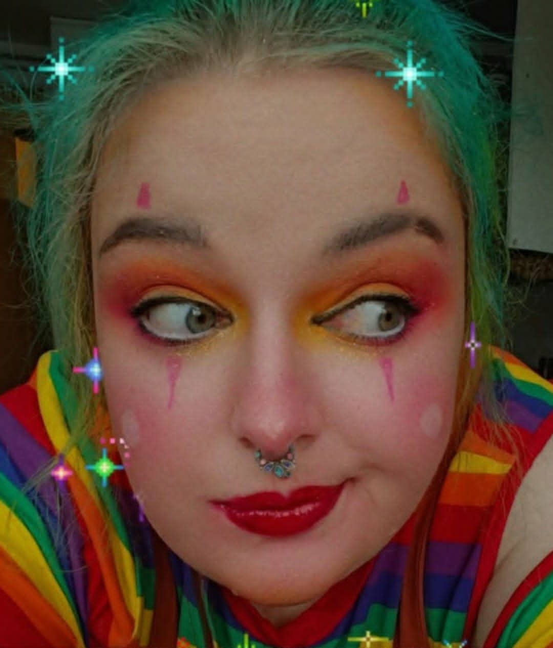 Harper now — blue hair and clown makeup
